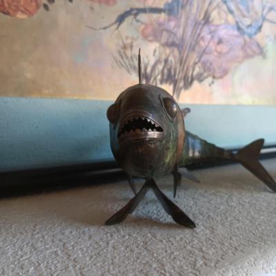 2 METAL FISH THAT ARE HINGED TO GIVE THE APPEARANCE OF MOVING