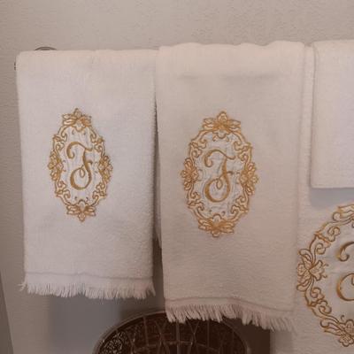 GUEST TOWELS, GOLD-TONE METAL WASTE CAN AND MORE