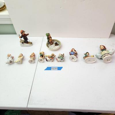 Collection of 11 Goebel Hummels Figurines Skier Boy Fishing Angle