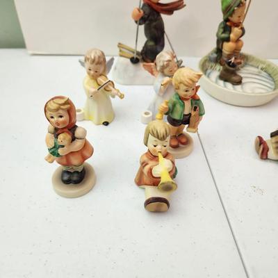 Collection of 11 Goebel Hummels Figurines Skier Boy Fishing Angle