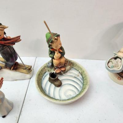 Collection of 11 Goebel Hummels Figurines Skier Boy Fishing Angle