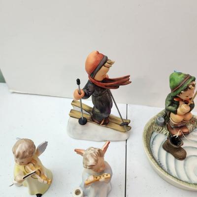 Collection of 11 Goebel Hummels Figurines Skier Boy Fishing Angle