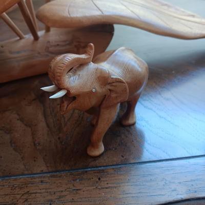 MID-CENTURY WOODEN LEAF SCULPTURE AND A WOODEN ELEPHANT