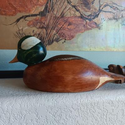HAND CARVED DUCK FROM ESTES PARK AND A CARVED TURTLE