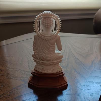 PICTURE MADE FROM SEA SHELLS AND AN ASIAN THEMED FIGURINE