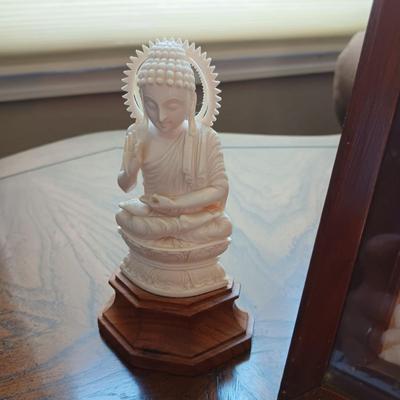 PICTURE MADE FROM SEA SHELLS AND AN ASIAN THEMED FIGURINE