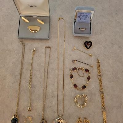 A VARIETY OF GOLD-TONE JEWELRY