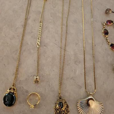 A VARIETY OF GOLD-TONE JEWELRY