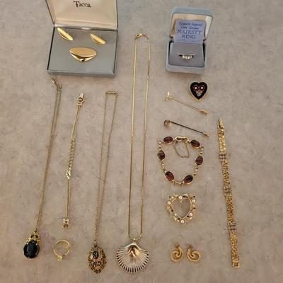A VARIETY OF GOLD-TONE JEWELRY