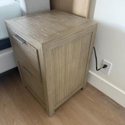 Sale Photo Thumbnail #46: The RH TEEN nightstand is a modern, minimalist piece designed for the bedroom. It features two drawers for storage and is crafted from light wood, offering a sleek finish. This fully assembled nightstand is suitable for indoor use and is part of the origi