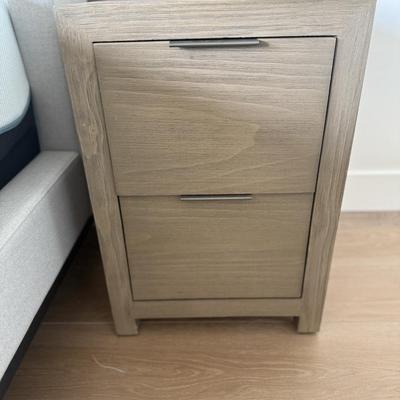 Sale Photo Thumbnail #44: The RH TEEN nightstand is a modern, minimalist piece designed for the bedroom. It features two drawers for storage and is crafted from light wood, offering a sleek finish. This fully assembled nightstand is suitable for indoor use and is part of the origi