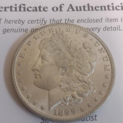 1899 US Mint Morgan Silver Dollar VF to AU Condition (#48)