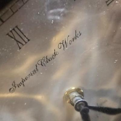 IMPERIAL CLOCK WORKS BOOK ENDS THAT ARE BATTERY OPERATED CLOCKS