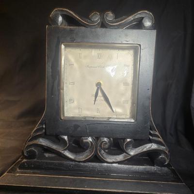 IMPERIAL CLOCK WORKS BOOK ENDS THAT ARE BATTERY OPERATED CLOCKS