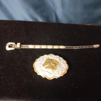 SILVER PLATE ON BRONZE BELT BUCKLE AND LEATHER W/CONCHO BRACELET