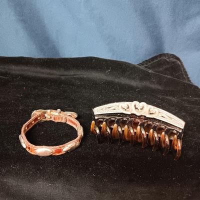 SILVER PLATED AND PLASTIC HAIR CLIP AND LEATHER BRACELET WITH METAL CONCHOS
