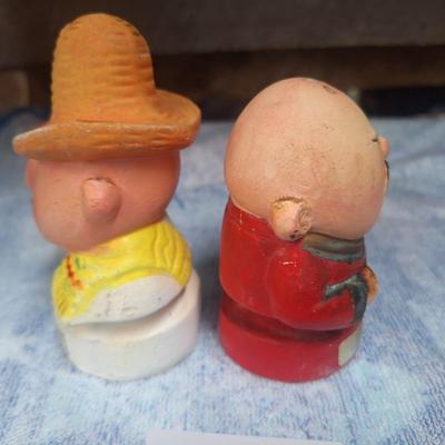 spice shakers- one for ginger and one for chili powder