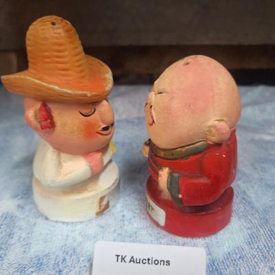 spice shakers- one for ginger and one for chili powder
