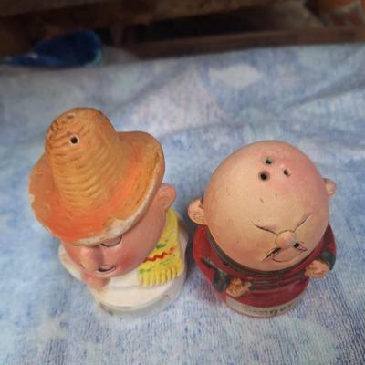 spice shakers- one for ginger and one for chili powder