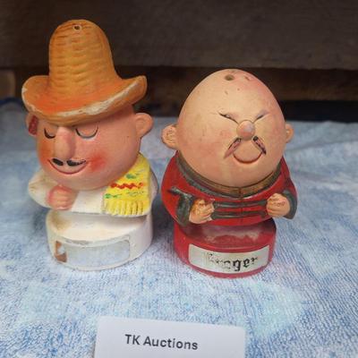 spice shakers- one for ginger and one for chili powder