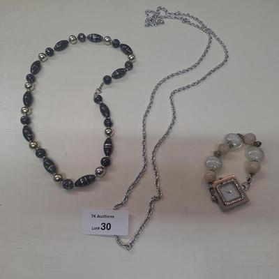 2 necklaces and a watch