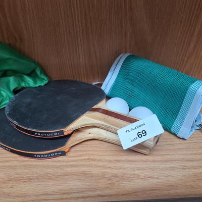 ping pong paddles and net