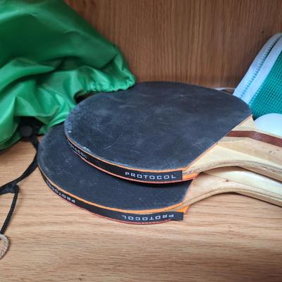 ping pong paddles and net