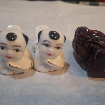 chopstick rests and small buddha