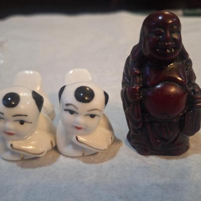 chopstick rests and small buddha