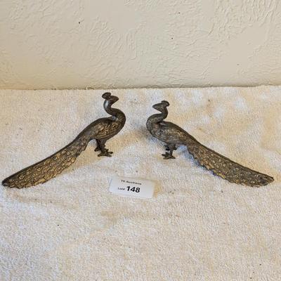 Brass peacocks