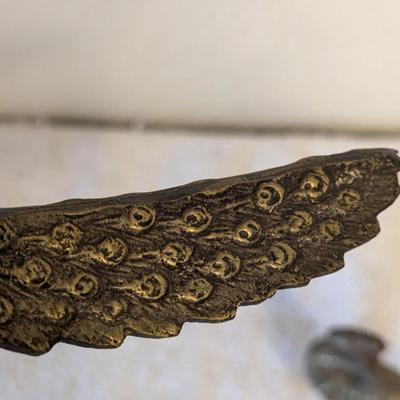 Brass peacocks