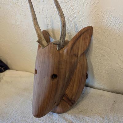 Hand carved redwood art mask with Antlers