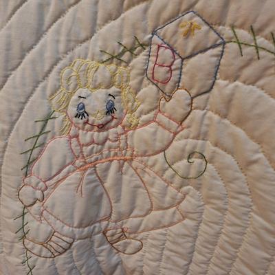 small embroidered quilt