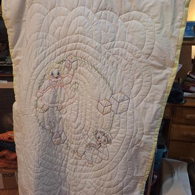 small embroidered quilt