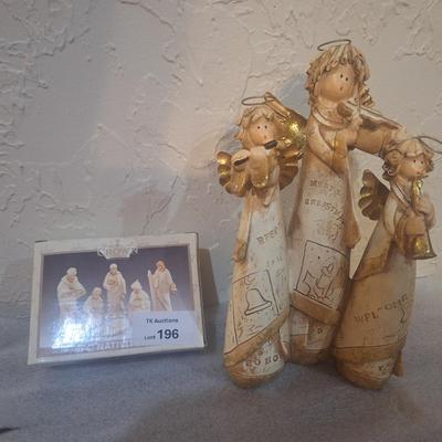 mini nativity scene and angels
