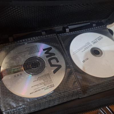 CD case with some CDs