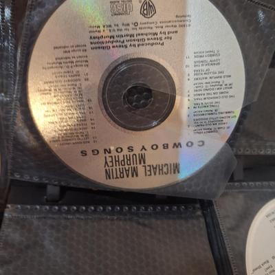 CD case with some CDs