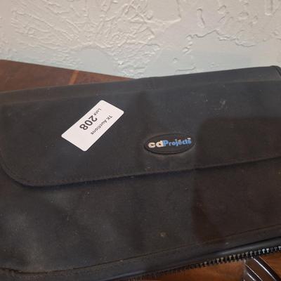 CD case with some CDs