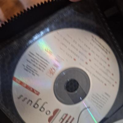 CD case with some CDs