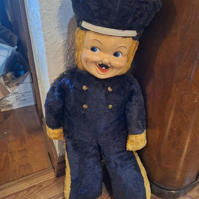 large vintage plush policeman with plastic face