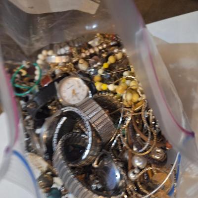 bag of jewery pieces- some may be broken or mismatched