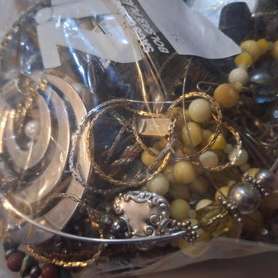 bag of jewery pieces- some may be broken or mismatched