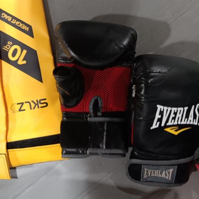 FOLDING MINI TRAMPOLINE, BOXING GLOVES, 10# MEDICINE BALL, ROLLER, 10# SAND BAGS? AND A DUFFLE BAG