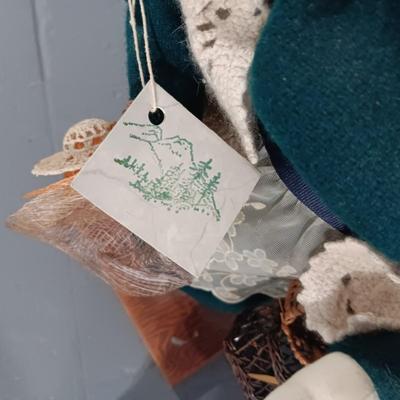 GRACEFULLY AGED COLLECTIBLE DOLLS