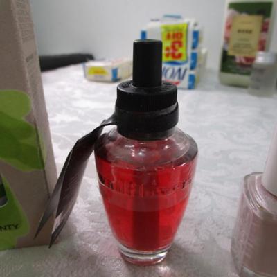 Sale Photo Thumbnail #47: Homemedics Peppermint essential oil, Bath & Body Works air fragrance refill, 3 bottles nail polish, 2 mini pkg of tissues, eye shadow, 2 lip balms