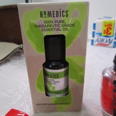 Sale Photo Thumbnail #45: Homemedics Peppermint essential oil, Bath & Body Works air fragrance refill, 3 bottles nail polish, 2 mini pkg of tissues, eye shadow, 2 lip balms