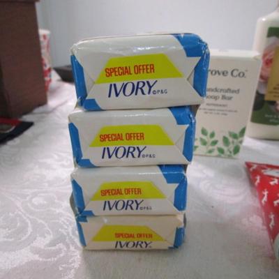 Sale Photo Thumbnail #59: 4 bars Ivory soap, hand sanitizer with purse hanger, Grove Co. Handcrafted soap bar-peppermint, Rose body lotion by Bath & Body Works, 2 tubes hand cream, green tea body wash