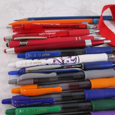 Sale Photo Thumbnail #79: 3 Lanyards, soft small football, pens, pencils, 2 carry straps, magnet, décor beads, earphones, staples, 11-in-1 wallet survival tool, clear bag, see pictures