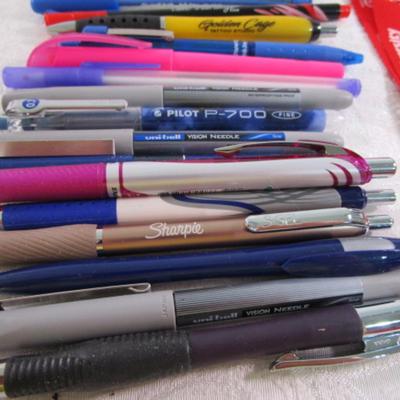 Sale Photo Thumbnail #76: 3 Lanyards, soft small football, pens, pencils, 2 carry straps, magnet, décor beads, earphones, staples, 11-in-1 wallet survival tool, clear bag, see pictures
