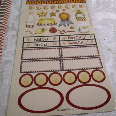 Sale Photo Thumbnail #92: Stickers, rubber stamp, ornament, small picture frame, Minnie Mouse sunglasses, jeans extenders, scrapbooking supplies, necklace extenders, fingernail stickers, see pictures